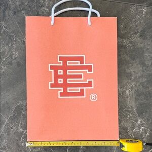 Eric Emanuel Orange Paper Gift Bag with Logo
